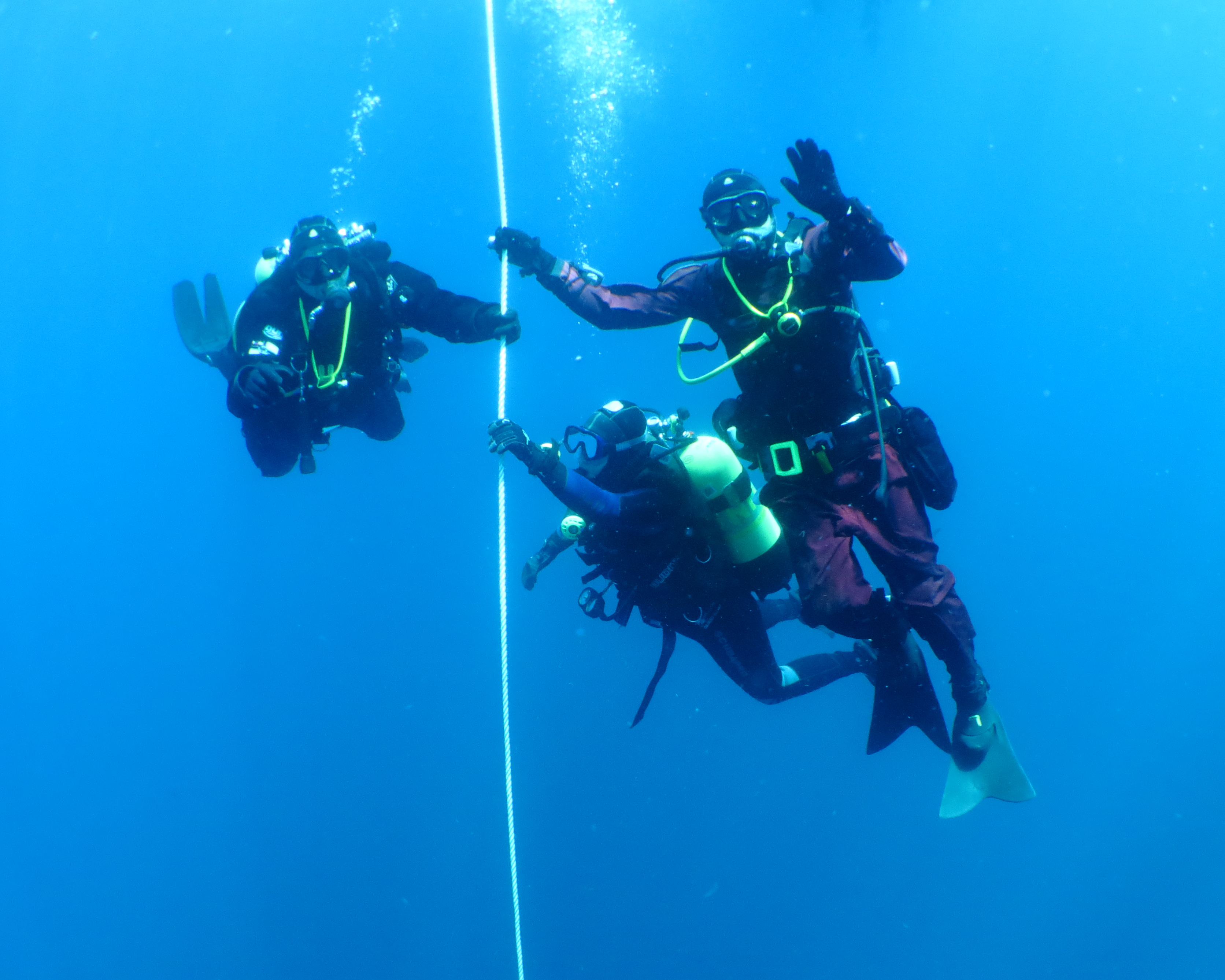 Divers on the shot line — Cathedral Cave, Poor Knights